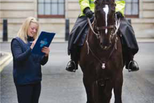  Gemma getting a member of the Metropolitan Mounted Police to complete the survey last year.